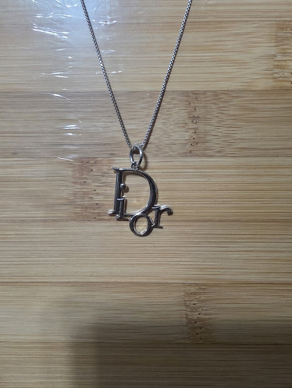 Authectic Dior Silver Logo Charm Necklace